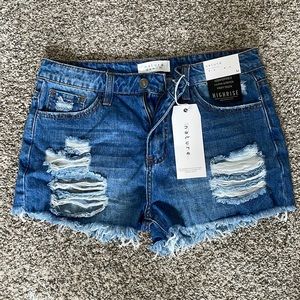 NWT Nature Denim shorts distressed and super cute. Size medium.